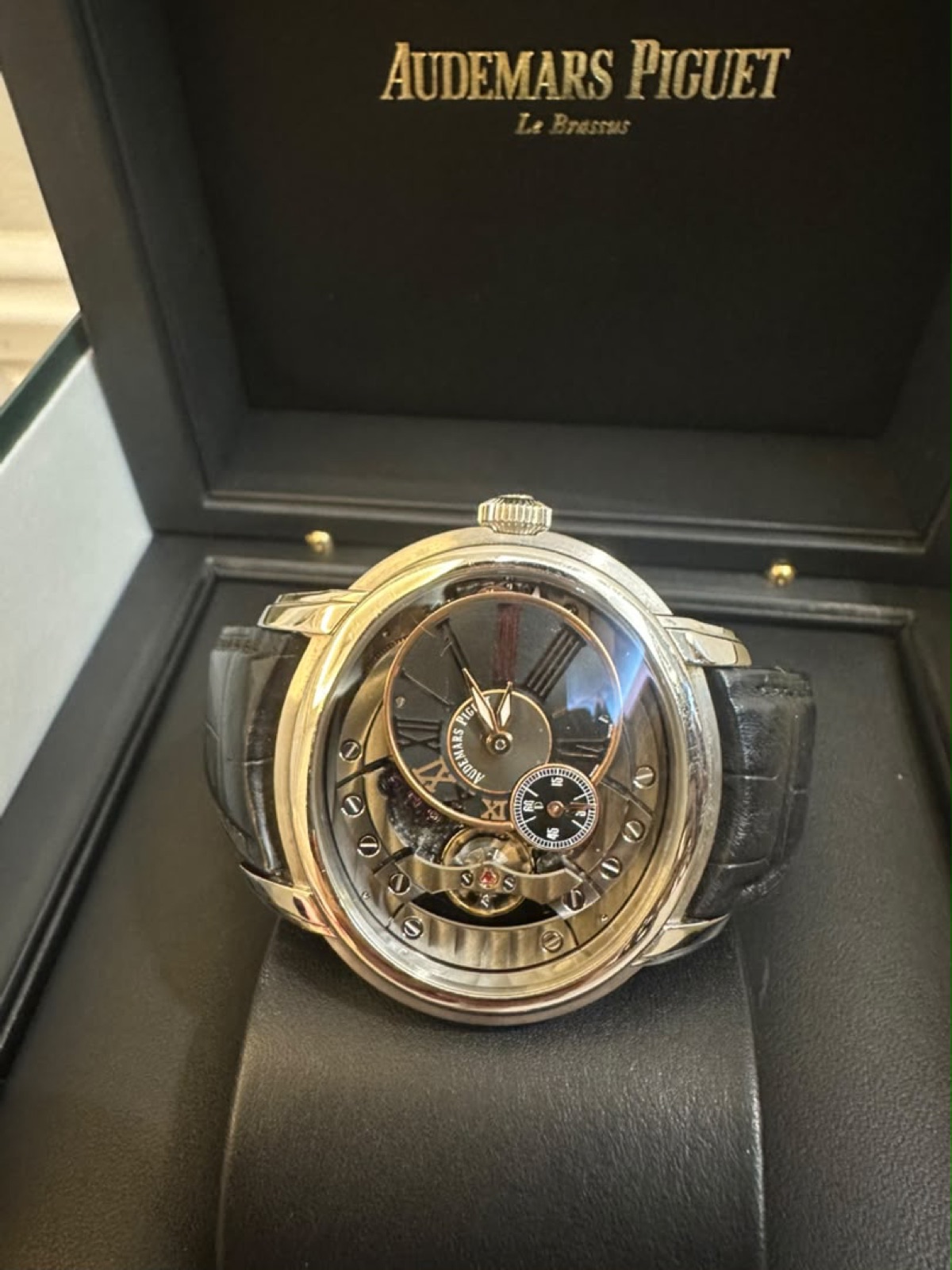 Audemars Piguet Millenary, in its presentation box, held in hand